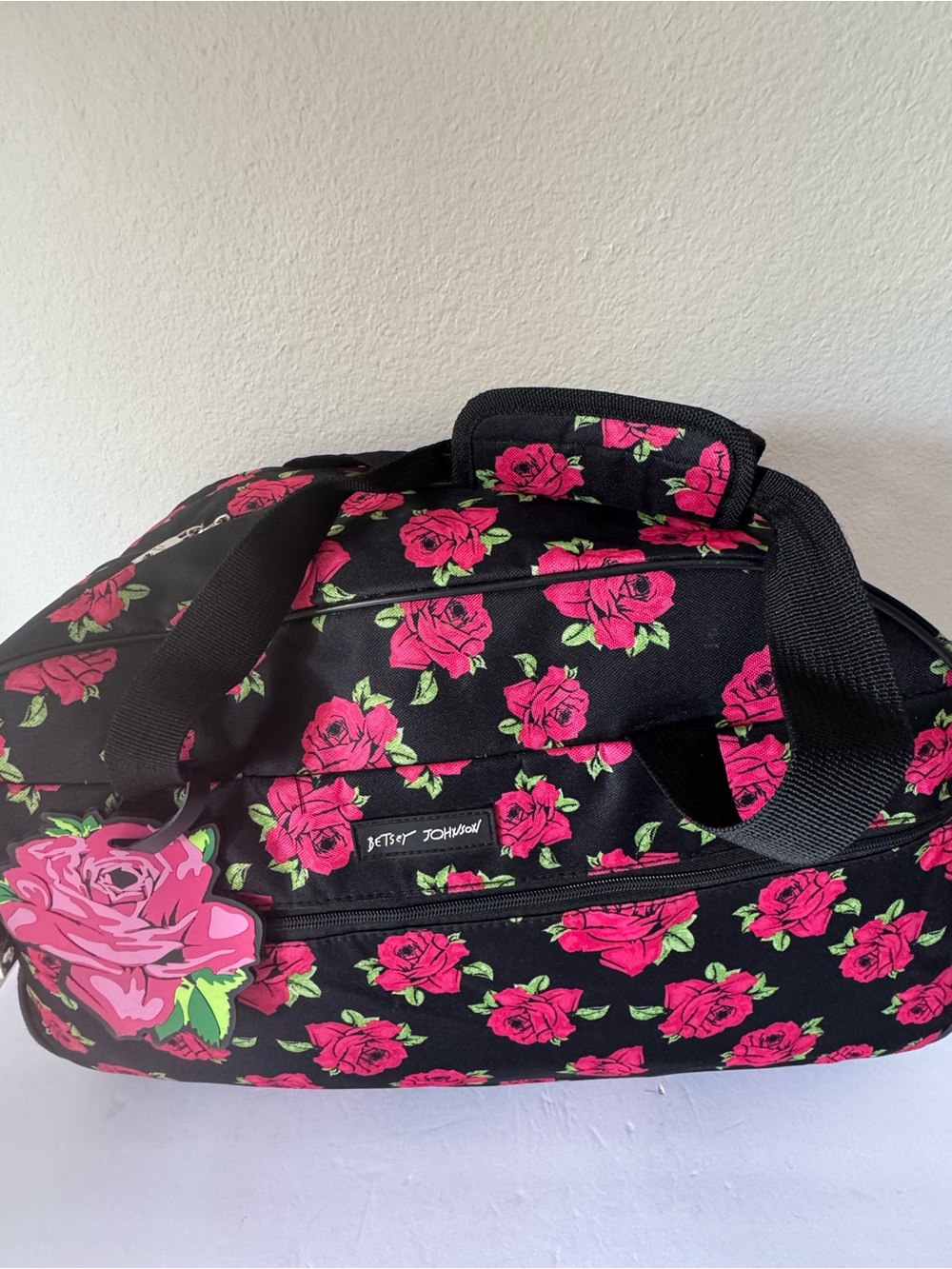 Betsey Johnson Black Canvas Rolling Duffel Bag with Hot Pink Rose Print